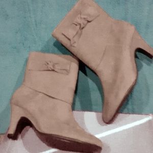 Women short heeled boots.